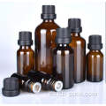Botella de aceite esencial de vidrio redondo de 50 ml con cuentagotas